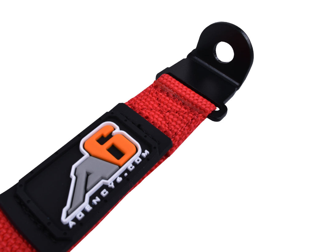 Red strap with a black buckle and logo on a white background