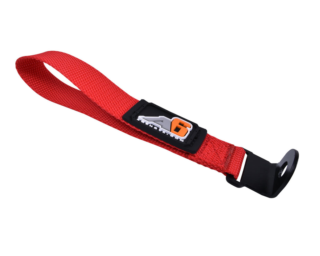 Red belt with a black buckle on a white background