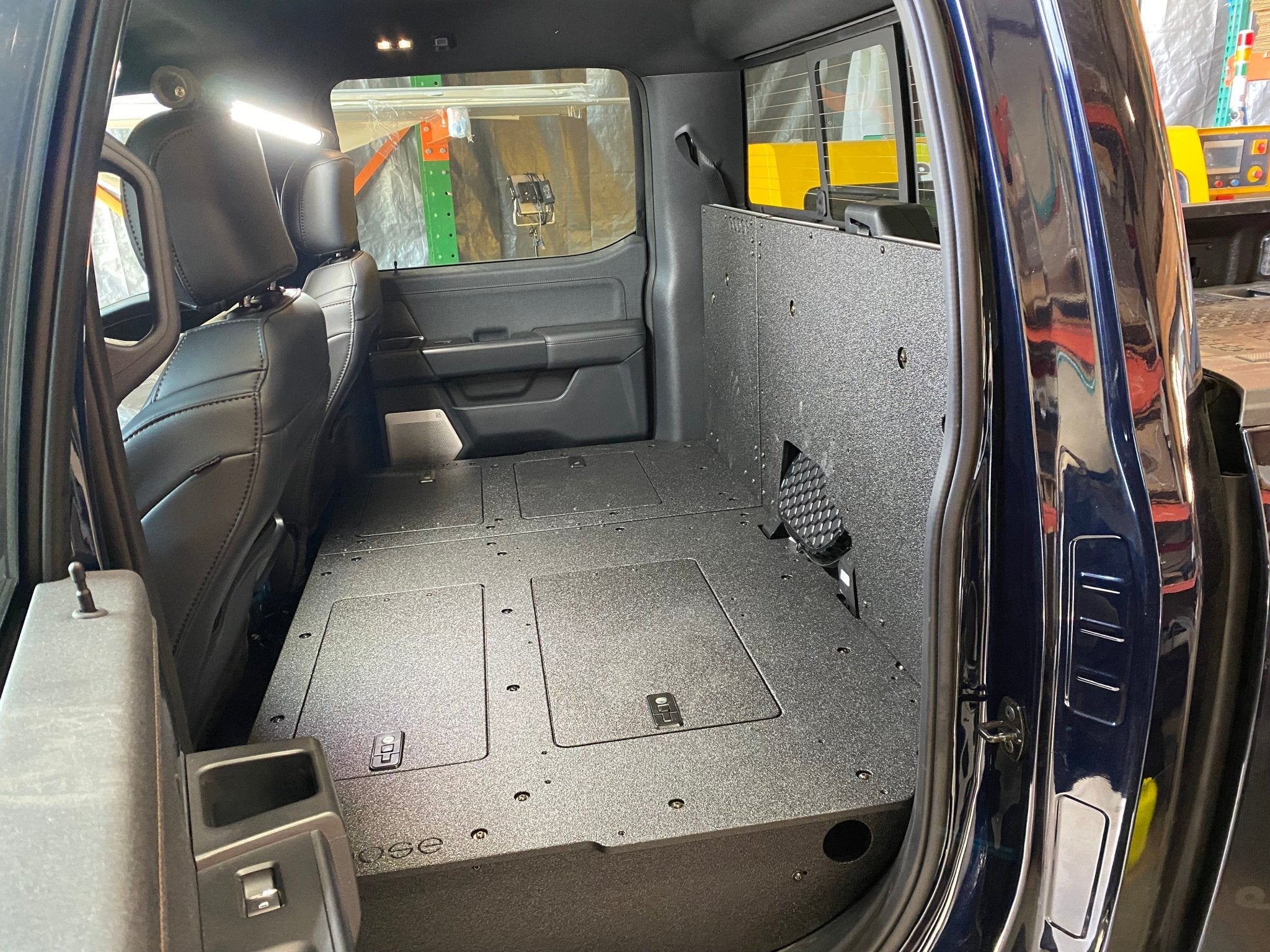 Ford Super Duty Ford - F250-F550 - 2023-Present - 5th Gen. Crew Cab - Second Row Seat Delete Plate System with Factory B&O Subwoofer Center Wall with Exterior Port
